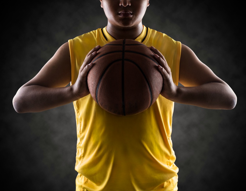 Young boy holding a basketball